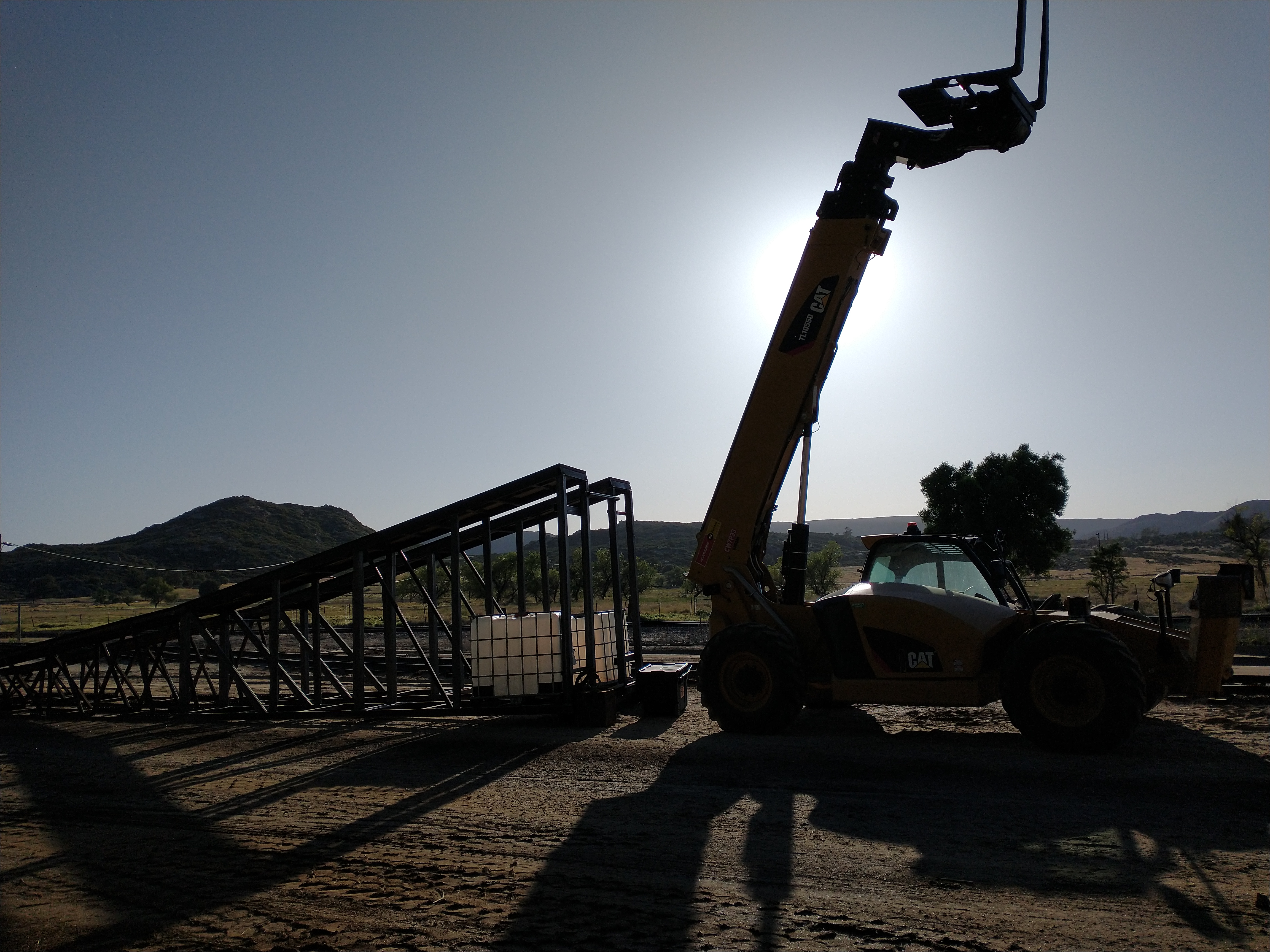 Equipment positioning the steel launch ramp at Campo
